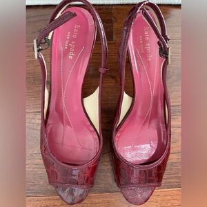 Kate Spade- sling back sandals with 2" heel. Wine colored with croc pattern.